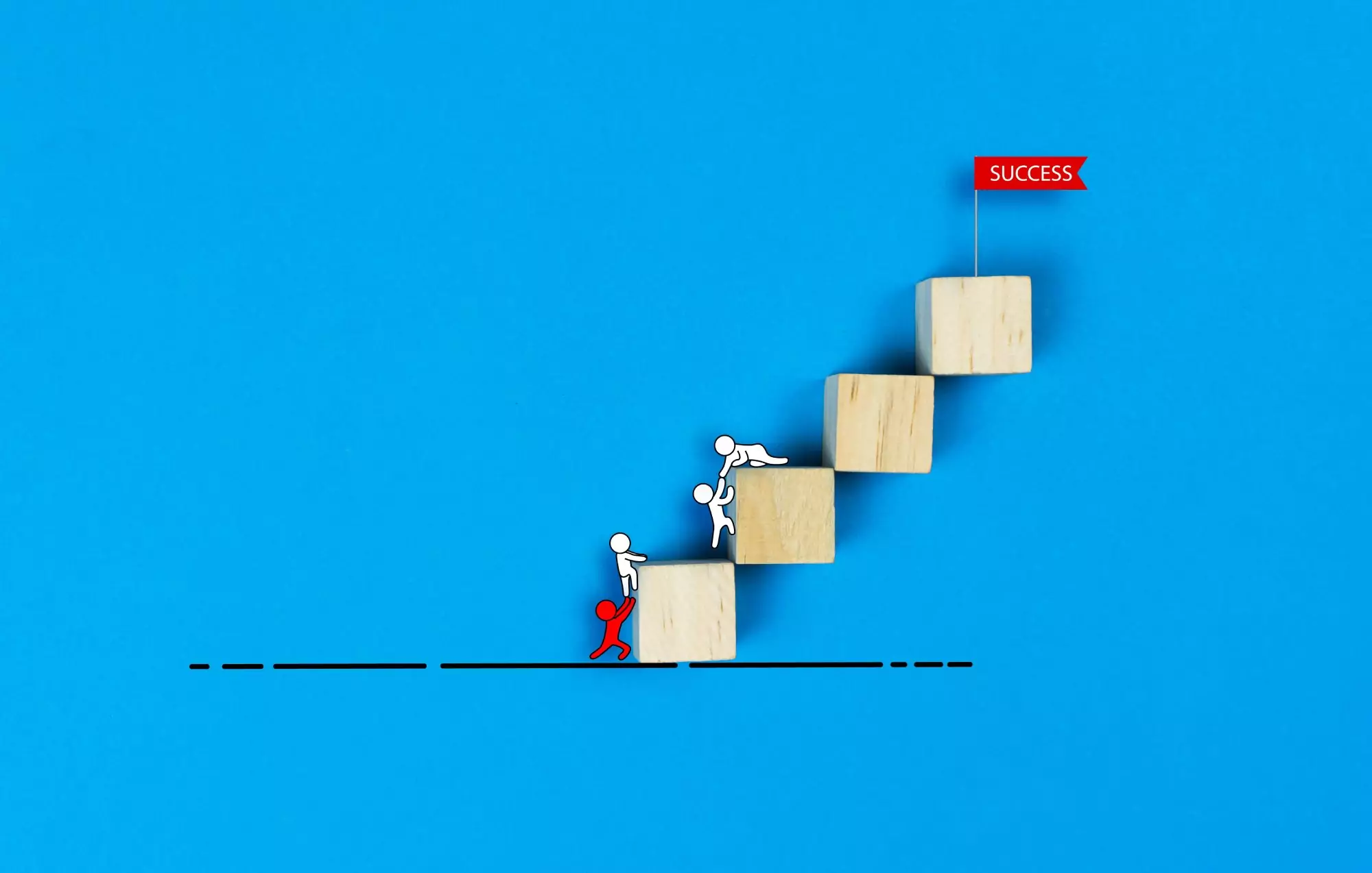 Helping people up stairs to success